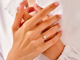14k Gold, 18k Gold, Yellow, White, Rose, 1 Carat Alternating Marquise Sidestone Moissanite Engagement Ring on a Woman's Ring Finger