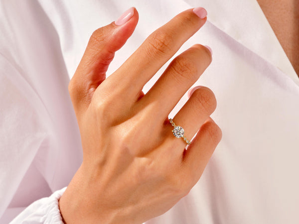 14k Gold, 18k Gold, Yellow, White, Rose, 1 Carat Milgrain Marquise Sidestone Moissanite Engagement Ring on a Woman's Ring Finger