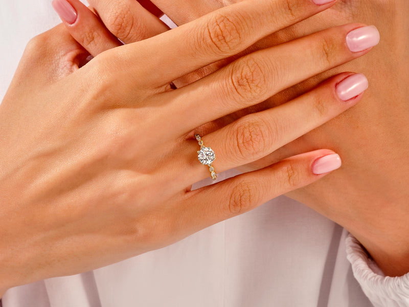 14k Gold, 18k Gold, Yellow, White, Rose, 1 Carat Milgrain Marquise Sidestone Moissanite Engagement Ring on a Woman's Ring Finger