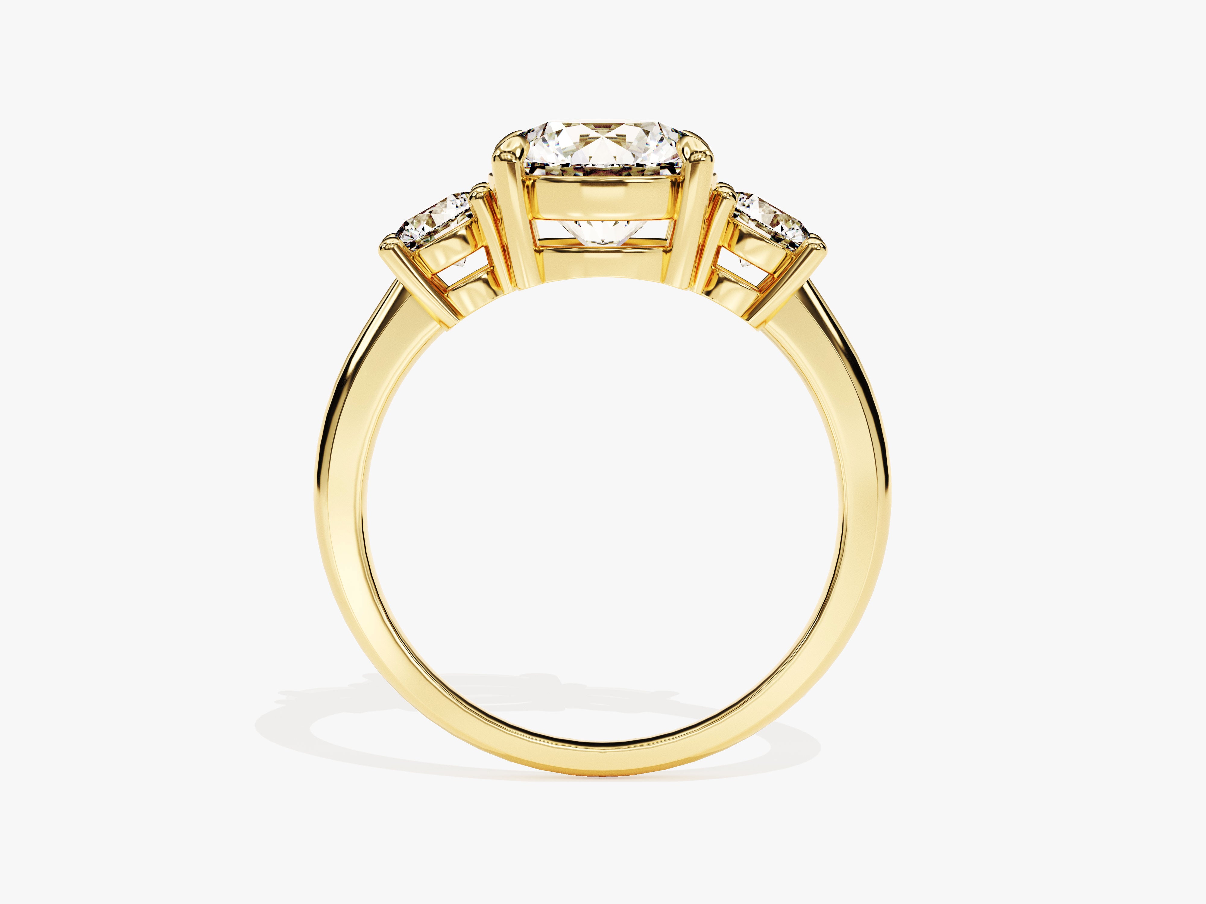 Gold three-stone diamond engagement ring from jewelry firm