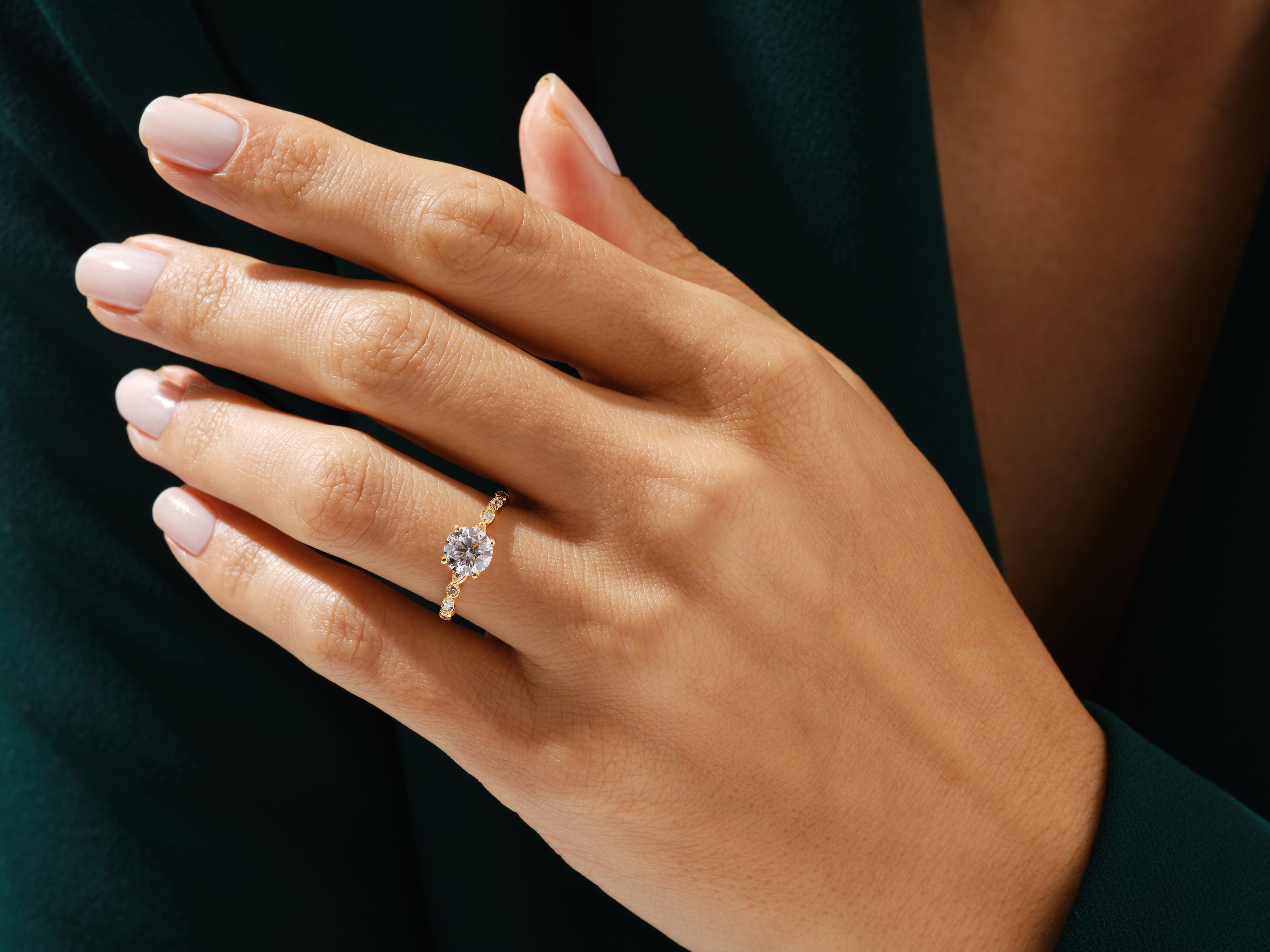 Gold diamond ring on a woman's hand, jewelry, engagement ring