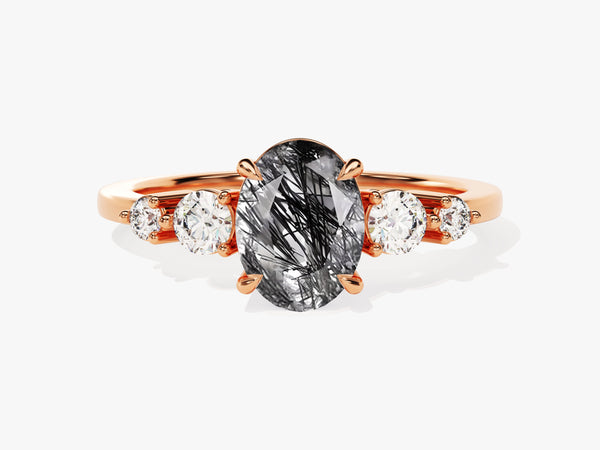 Rose gold ring with oval rutilated quartz and diamonds