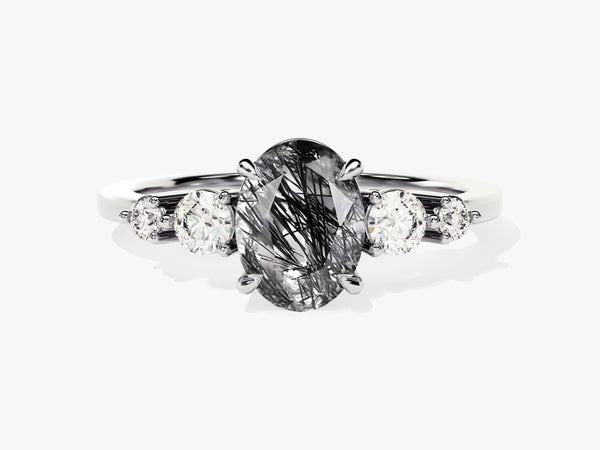Oval rutilated quartz and diamond engagement ring