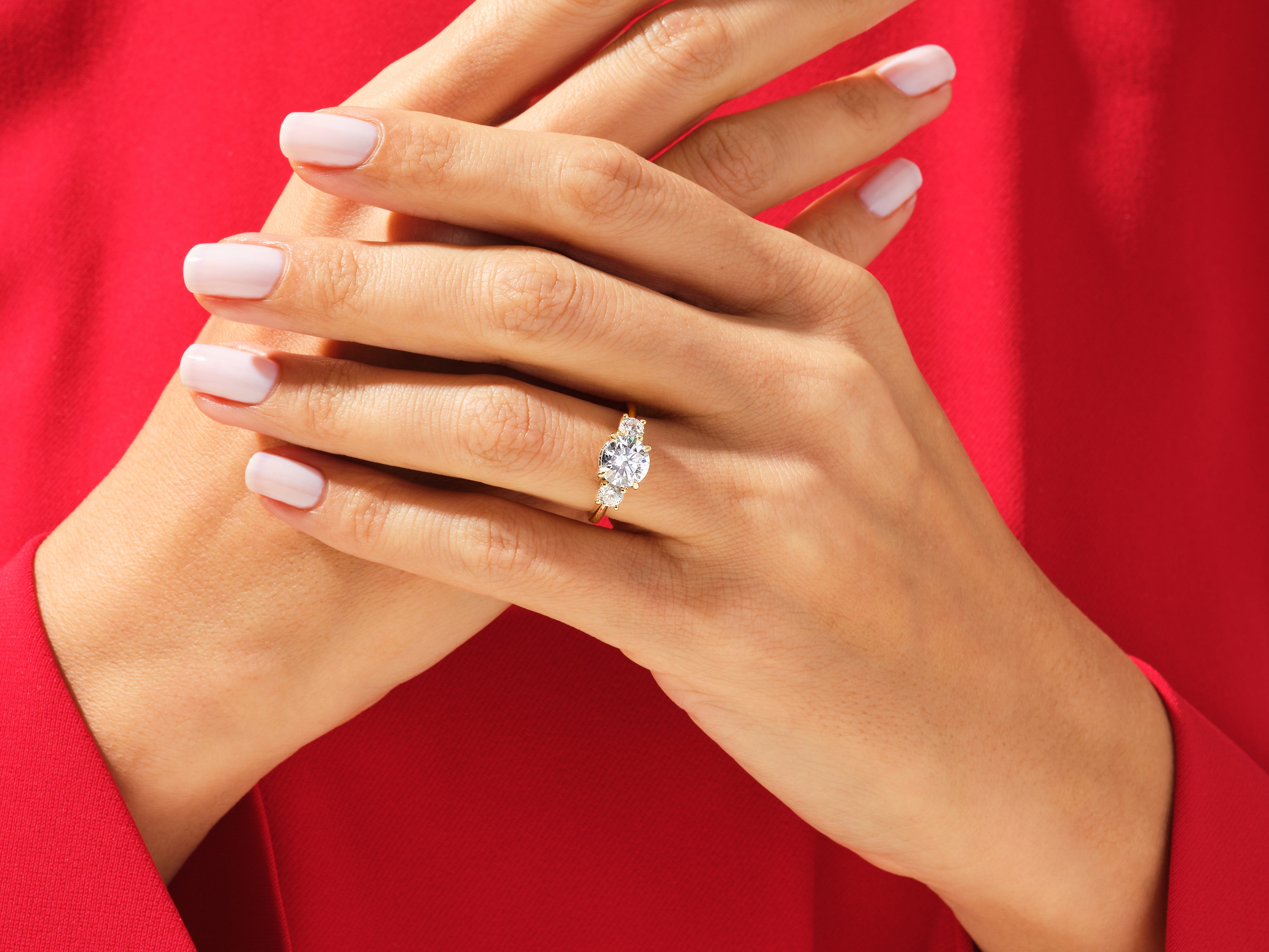 Diamond engagement ring on hand, luxury jewelry for women