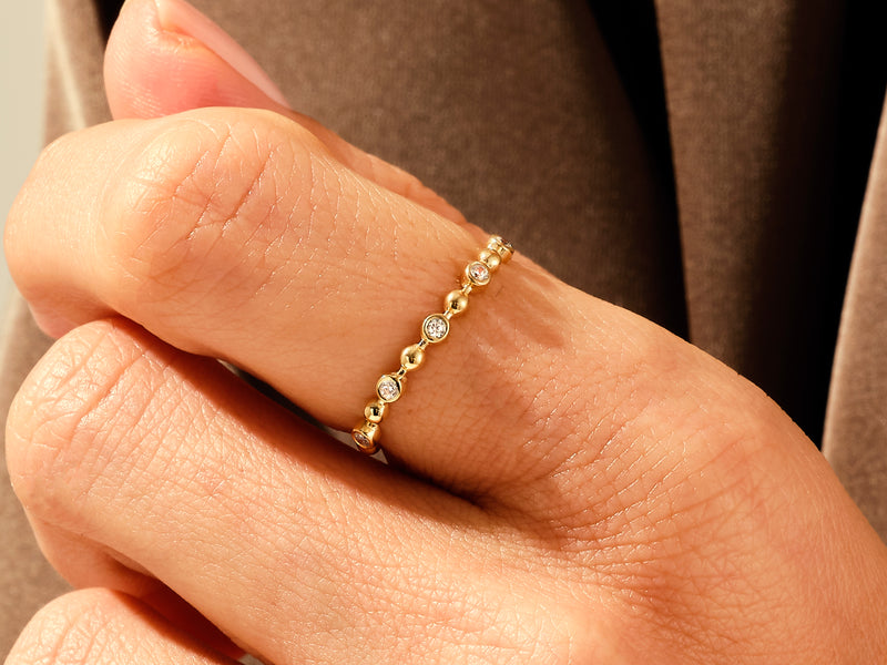 Yellow, White, Rose, 14k Gold, 18k Gold, Bezel and Ball Diamond Ring on a Woman's Finger