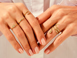 Yellow, White, Rose, 14k gold, 18k gold, Different Designed Fashion Rings on a Woman's Fingers 
