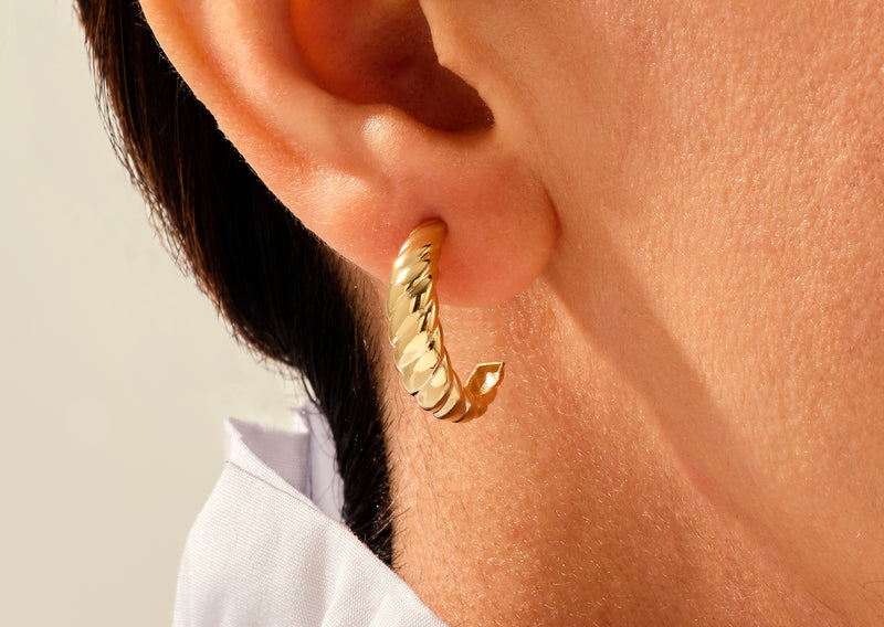 14k Gold, Yellow, White, Rose, 14k Yellow Gold Bold Croissant Earrings Hoops in a womans ear